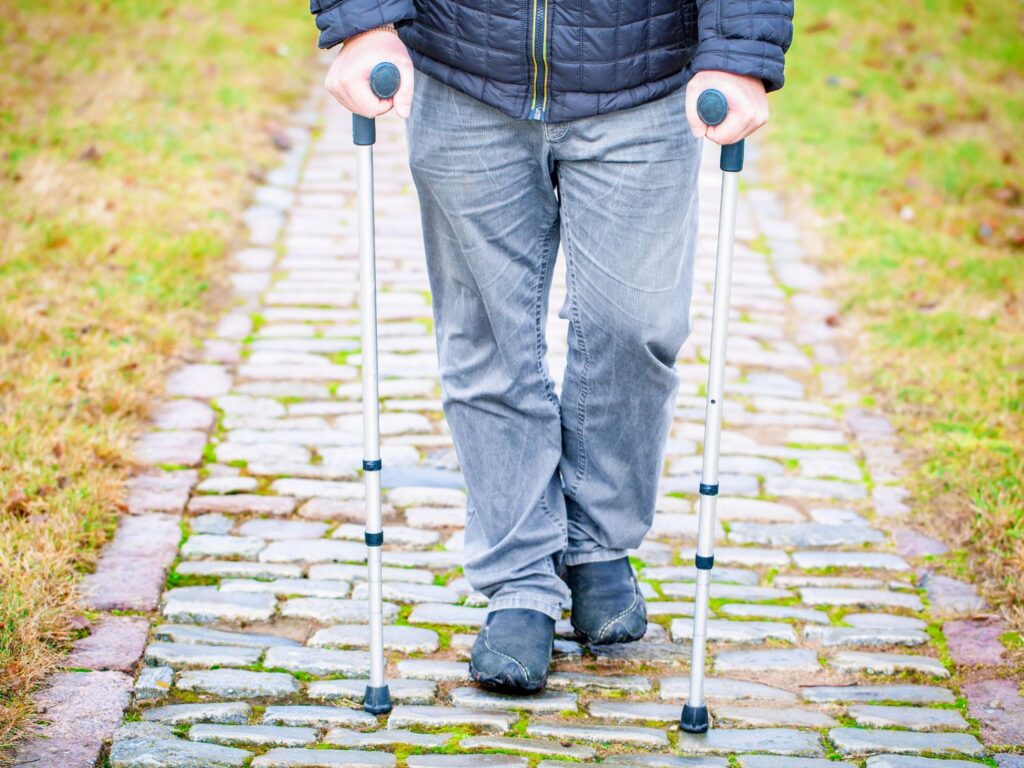 disabled veteran on crutches